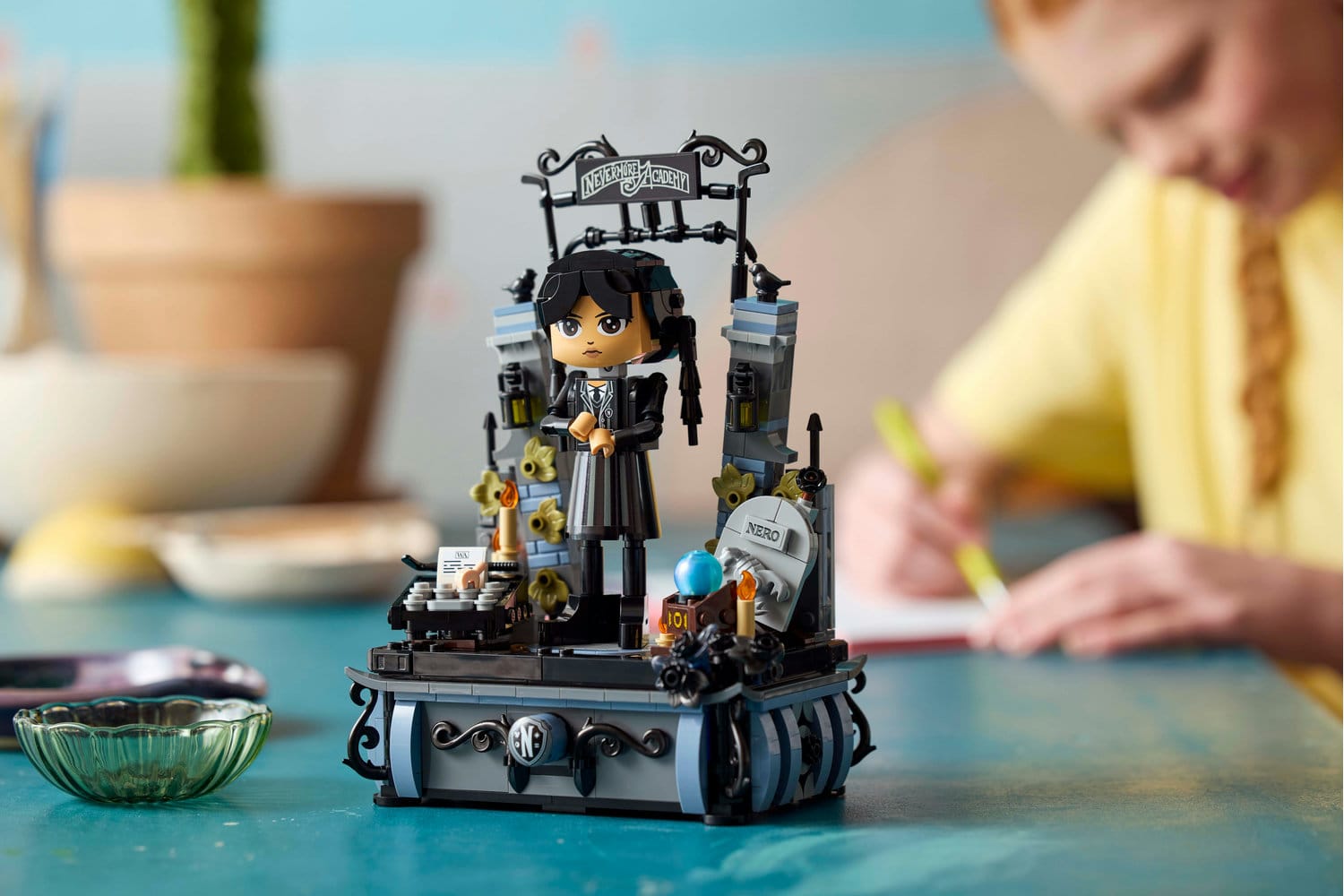 Photo of the LEGO Wednesday Addams Figure (76780) building toy set with blurred background